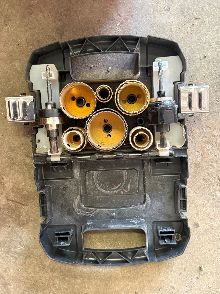(1) Hole saw set with arbors and case insert