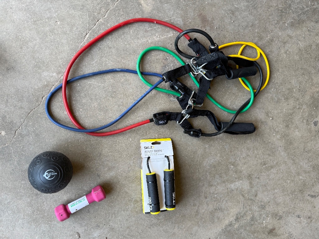 (1) Lot of exercise equipment with SKLZ jump rope & resistance bands