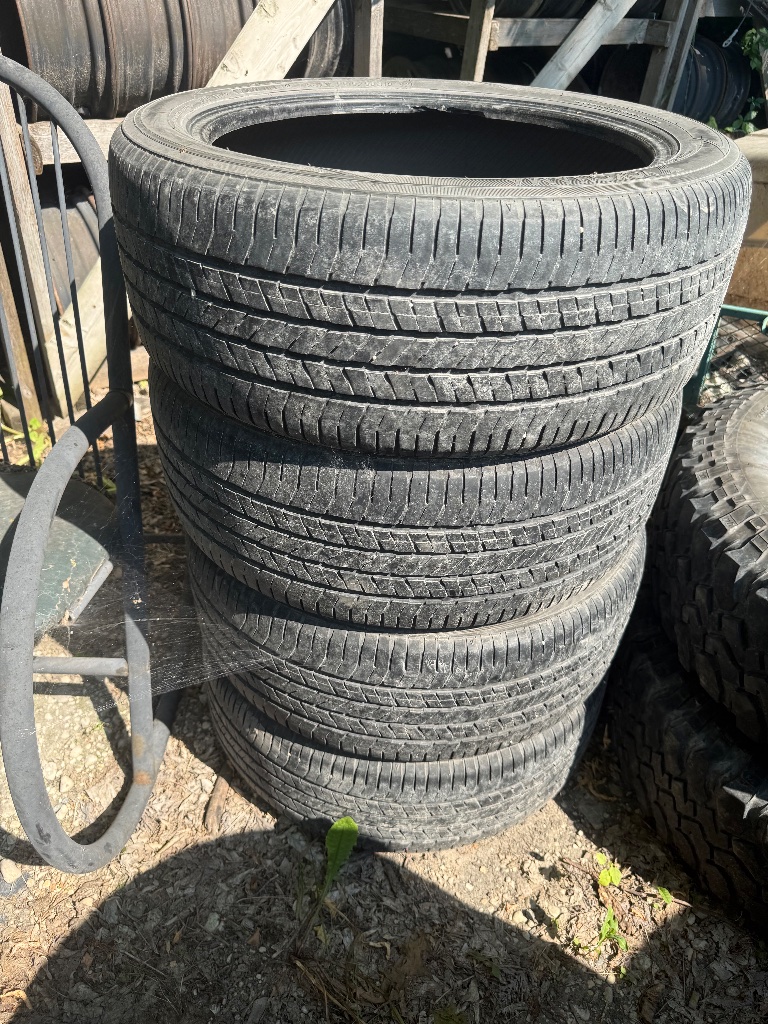 (4) P215/50R18 tires